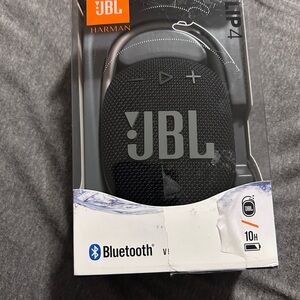 JBL Bluetooth speaker.